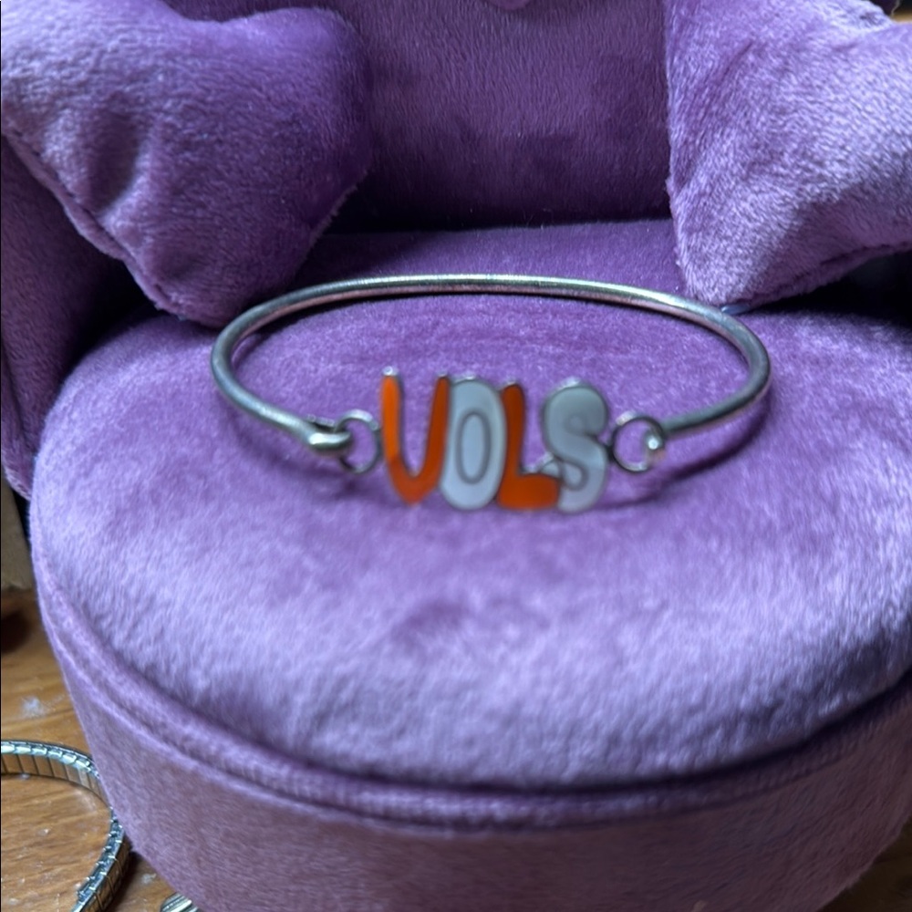 Silver Bracelet with Orange and White 'VOLS' Charm